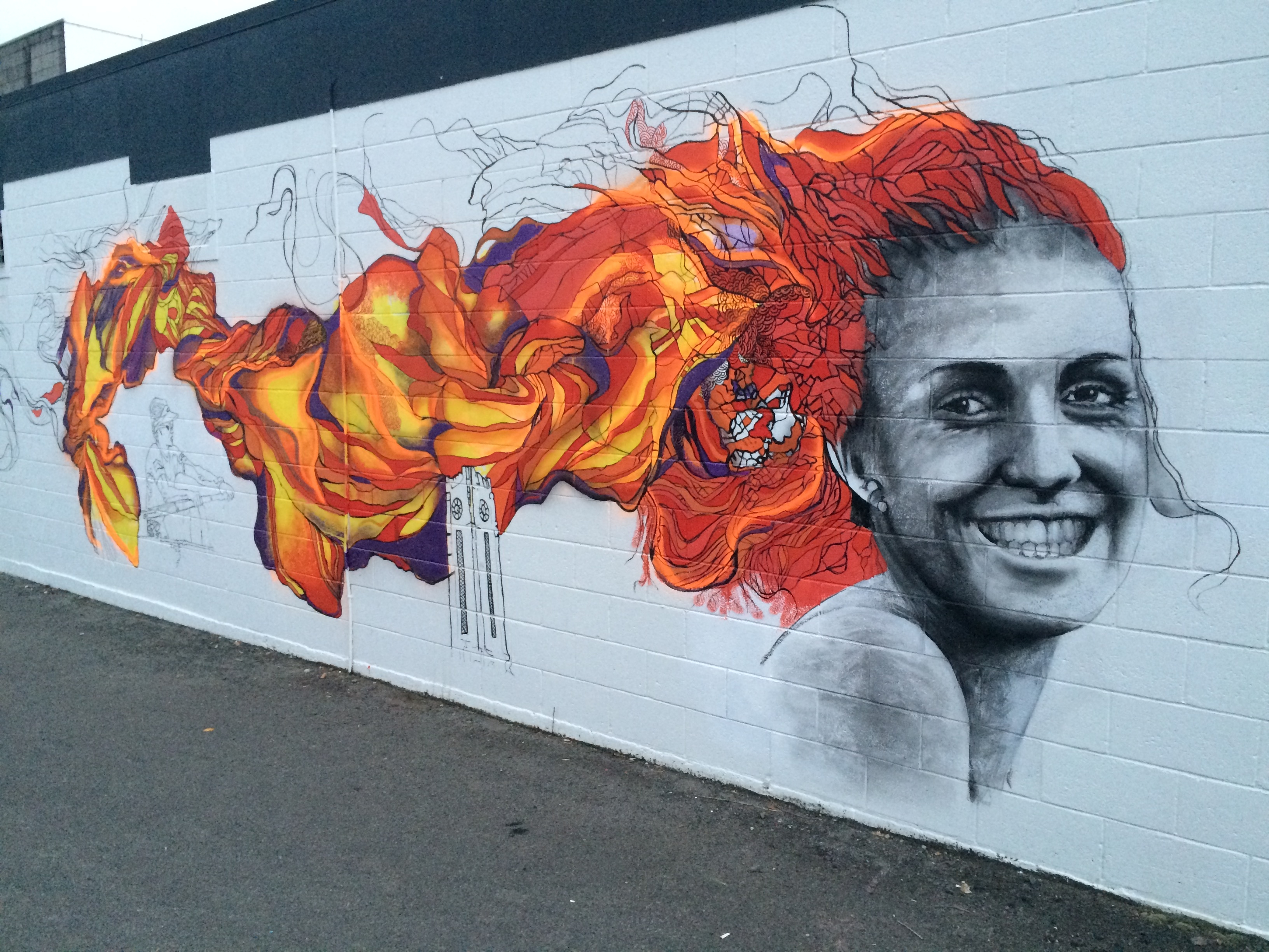 Mural at Rouge Cafe, Cambridge, featuring rower Emma Dyke